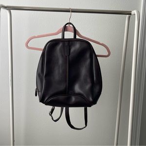 90s leather backpack.
